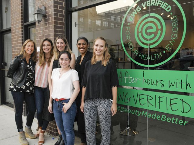 Group of women in front of the After Hours with EWG Verified event sign