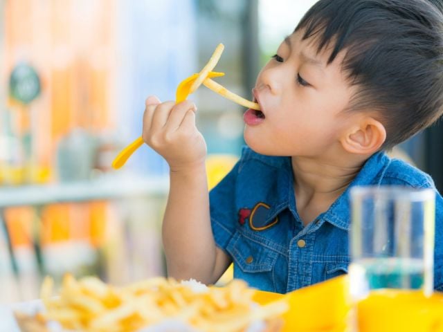 Child eating fries