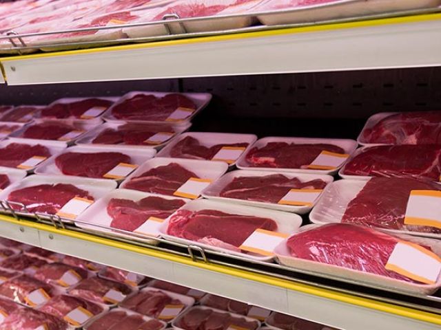 Meat Packaged on shelves in the grocery store