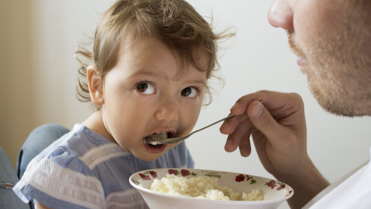 Baby eating rice porridge