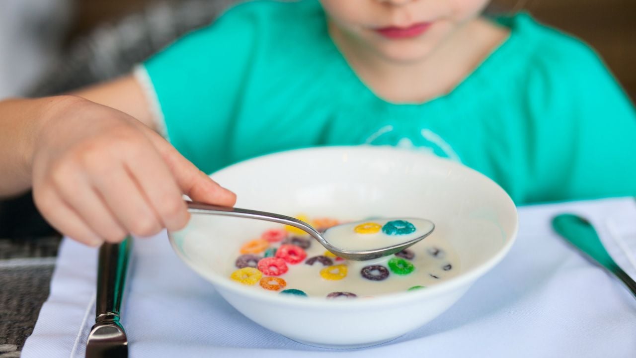 group of kids eating cereal